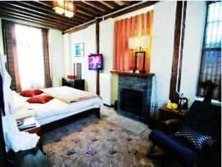 Lijiang Shishan Zhuyuan Hotel Екстериор снимка